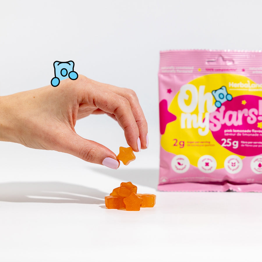 Herbaland Gummies - A close up of gummies with oh my low sugar high fibre candies in pink lemonade flavor
