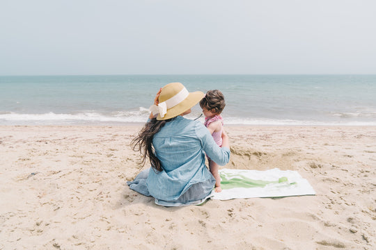 Mom and daughter on the beach