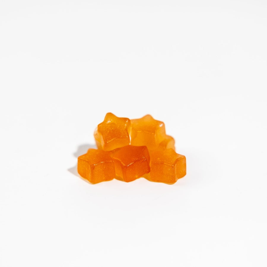 Herbaland Gummies - Close-up of low sugar, high fibre gummies in pink lemonade flavor