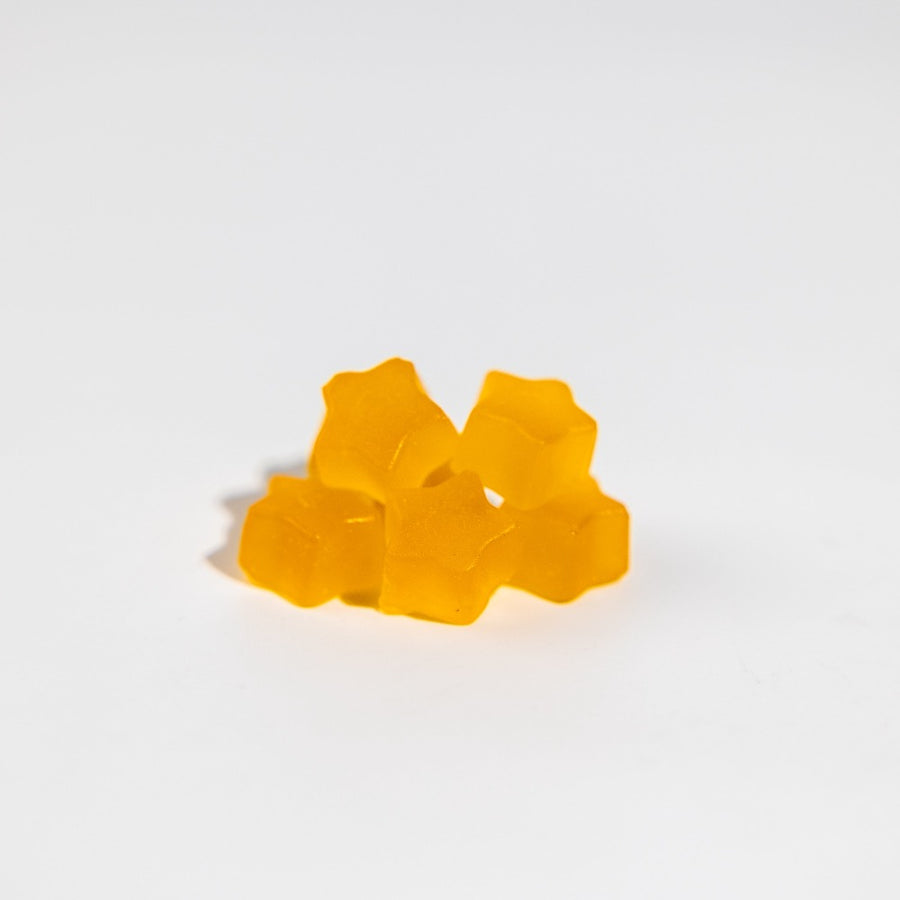 Herbaland Gummies - Close-up of low sugar, high fibre gummies in banana shake flavor