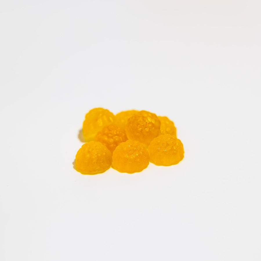 A picture of herbaland snacks with benefits gummies with turmeric and ginger with pineapple flavor