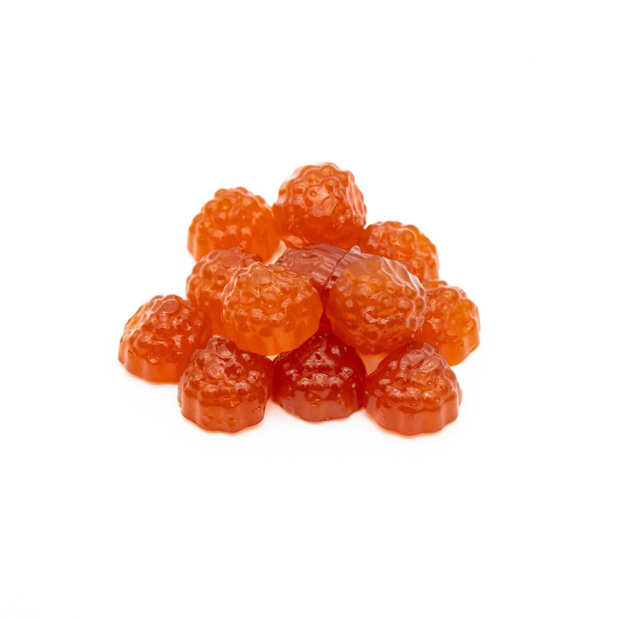 A close up picture of herbaland gummies of omega-3 for adults with orange flavor 